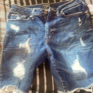 Blue ripped jean shorts